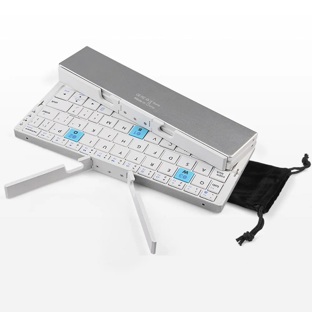 All-in-One Compact Keyboard: Foldable Bluetooth Keypad for Ultimate Portability